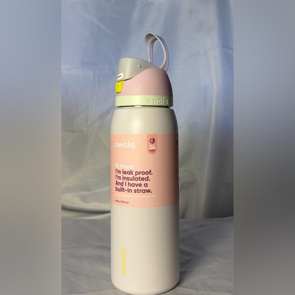Owala insulated water bottle with a built-in straw. Candy Coated Owala 40 oz. 1